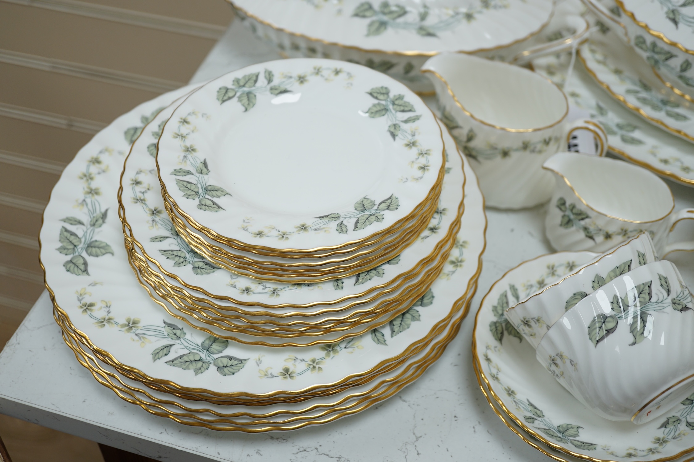 A Minton 'Greenwich pattern' bone china dinner and part tea service